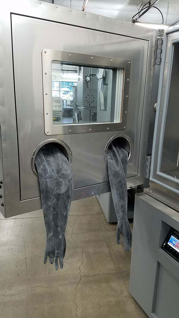 Gloves hanging from opened door